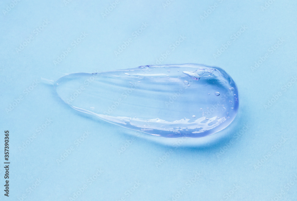 Cream gel blue transparent cosmetic sample on same color background Cream gel blue transparent cosmetic sample on same color background