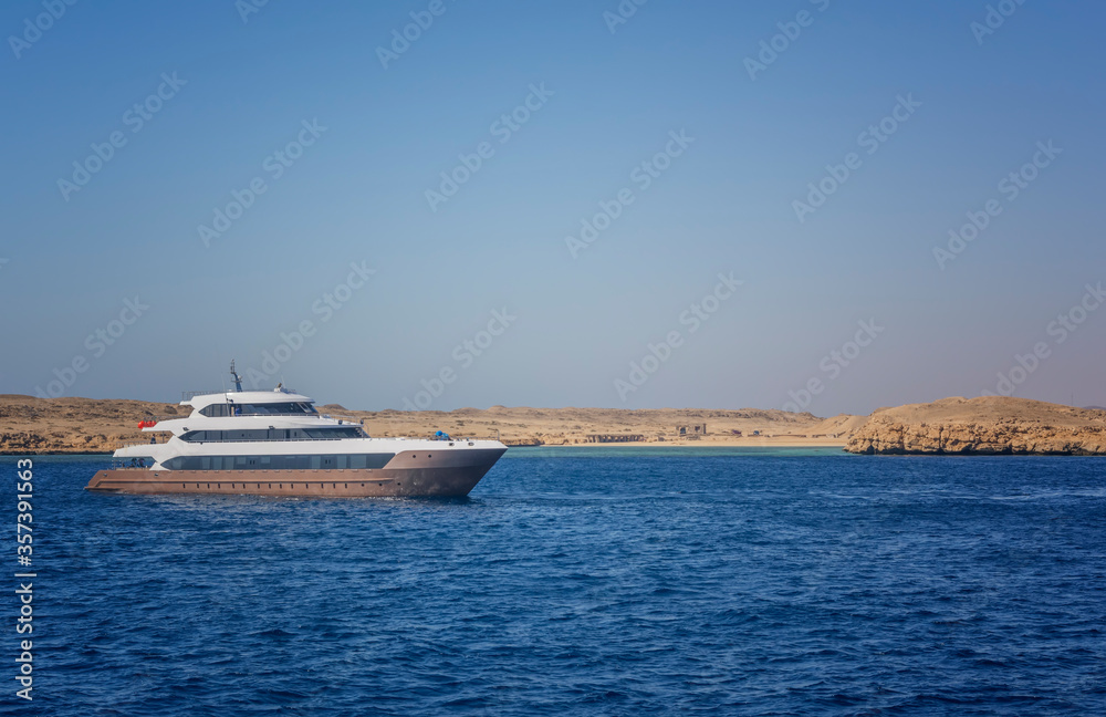 Luxury yacht in the Red Sea against the blue sky of the unique Ras Mohammed.