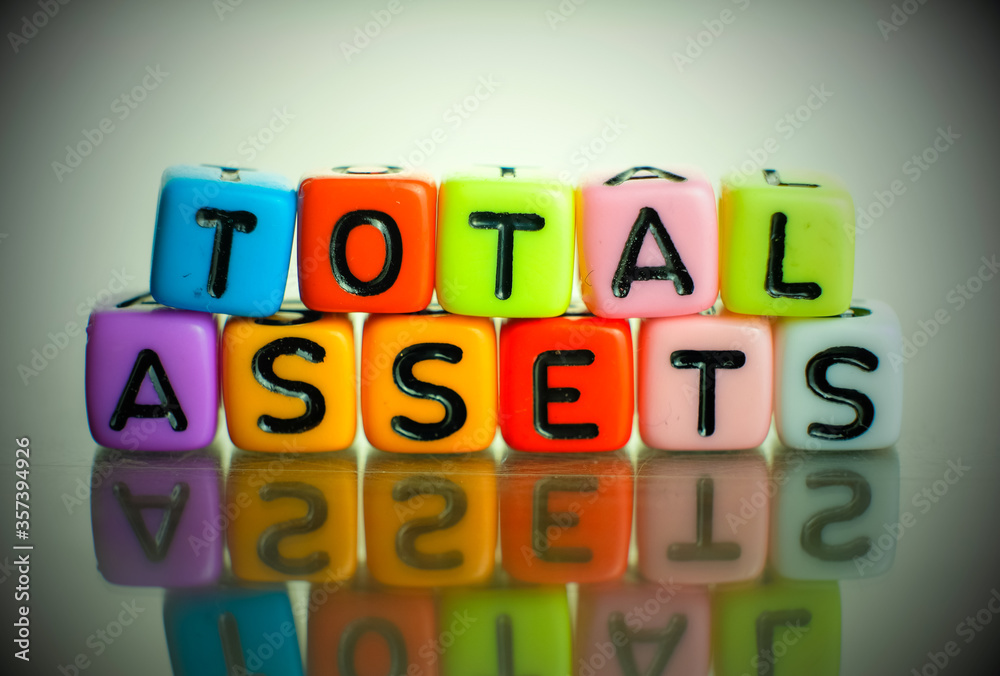 Conceptual of total asset a balance sheet items financial statements spelled on colorful alphabet beads. Isolated over reflective dark background. Focus on Conceptual of total asset a balance sheet items financial statements spelled on colorful alphabet beads. Isolated over reflective dark background. Focus on