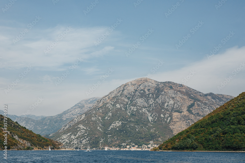 Verige Strait in Kotor Bay, Montenegro, against the backdrop of the city of Perast.