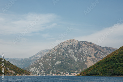 Verige Strait in Kotor Bay  Montenegro  against the backdrop of the city of Perast.