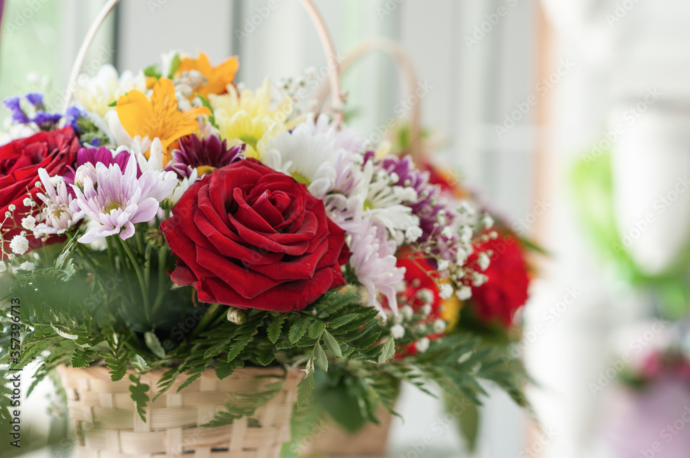 Colorful flower bouquet on the shelf. Flower business. Multi-colored bouquet. Selective focus. Macro photo. Colorful flower bouquet on the shelf. Flower business. Multi-colored bouquet. Selective focus. Macro photo.