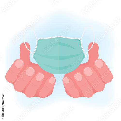 hands is holding a surgical mask to advertise wearing mask campaign