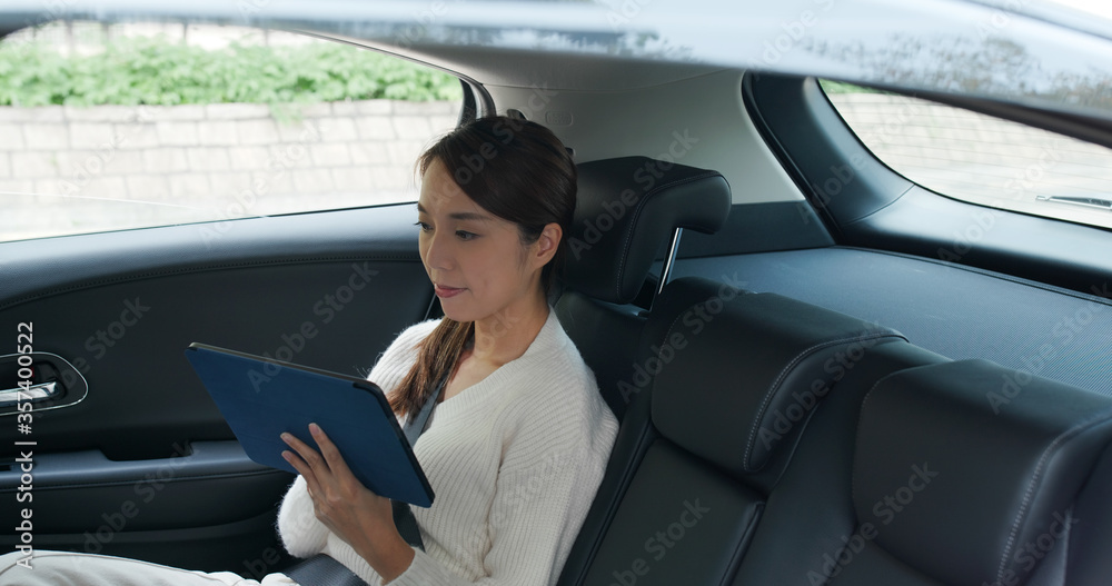 Businesswoman work on tablet computer Businesswoman work on tablet computer