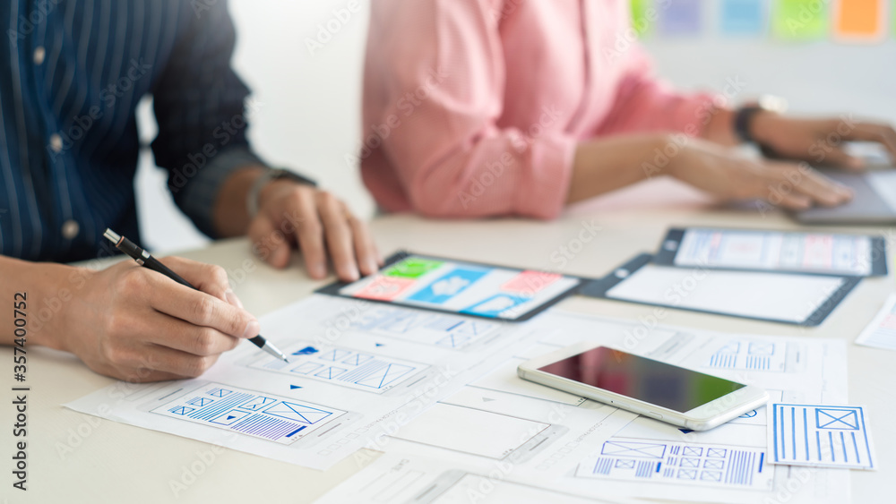 Graphic designers team work together Graphic designers team work together