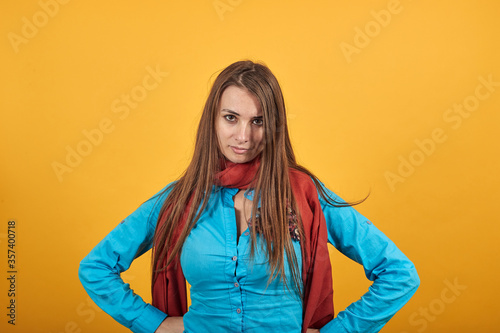 Standing, holding hands on waist displeased some rude behavior. Irritation, misunderstanding, looking in resentment, revolting look, being dissatisfied, screaming anger. Angry wife having quarrel