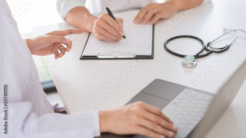 Doctor and patient consults or discussing about diagnosis