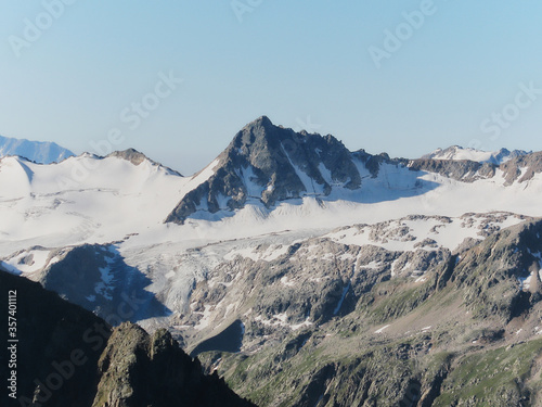 Mountains Landscape Travel aerial view from north side of Elbrus mount serene scenery wild nature calm idyllic scene. Snow-covered beautiful mountains.