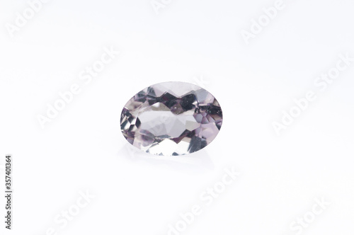 natural violet morganite oval shape on the white background