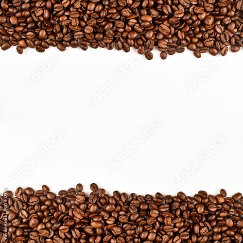 Roasted coffee beans isolated on white background. Border coffee bean decorated with blank copy space for your message.