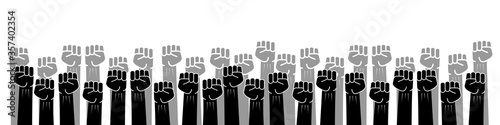 People raised fist air fighting for their rights , labor movement, election movement concept