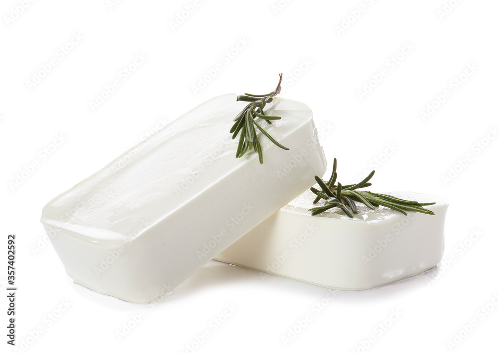 Tasty feta cheese with herbs on white background Tasty feta cheese with herbs on white background
