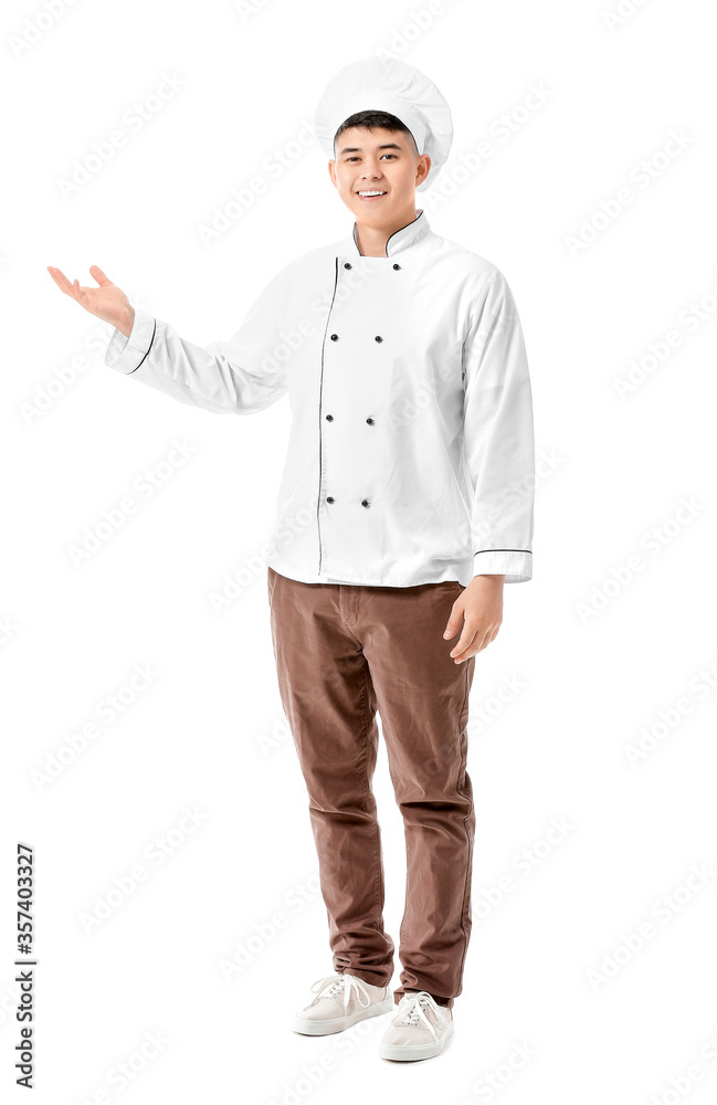 Handsome Asian chef Handsome Asian chef showing something on white background Handsome Asian chef Handsome Asian chef showing something on white background