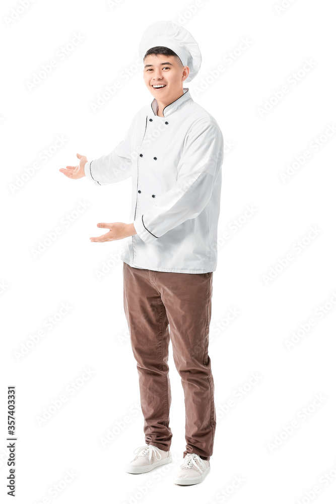Handsome Asian chef Handsome Asian chef showing something on white background Handsome Asian chef Handsome Asian chef showing something on white background