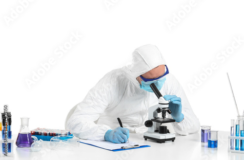 Scientist working with micr...