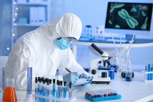 Scientist working with samp...