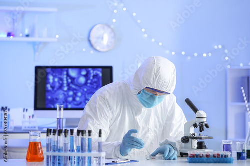 Scientist working with samp...