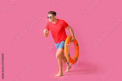 Running beach rescuer with ...