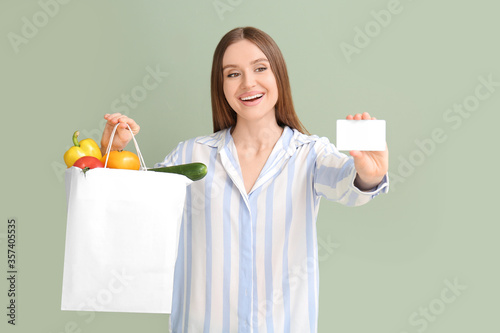 Young woman with food in ba...