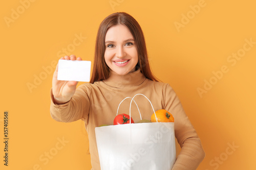 Young woman with food in ba...