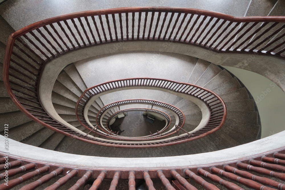 Fototapeta premium Spiral staircase in a tenement house in Poland