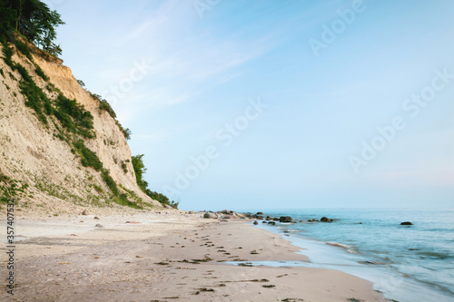 Amazing rocky beach landscape. Copy space background.