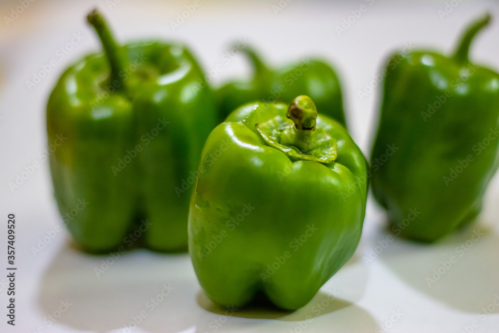 Fresh green capsicum or bell pepper isolated on a white background
Fresh green capsicum or bell pepper isolated on a white background