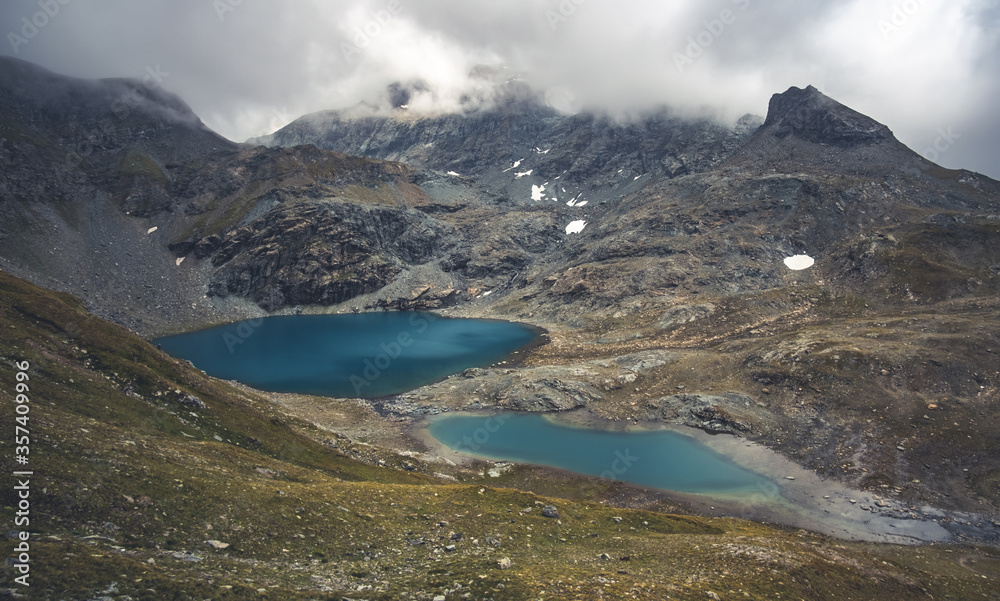 Blue lakes surrounded by alpine mountains