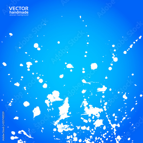 Blue background with splashes of white paint