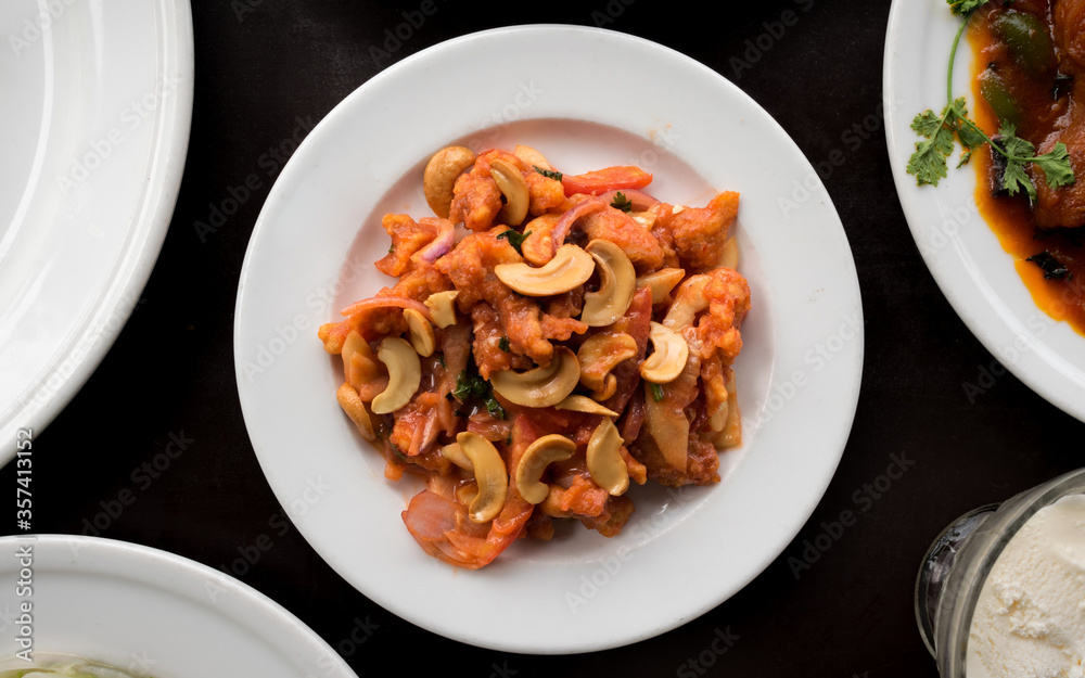 cashew nut salad on a plain white plate cashew nut salad on a plain white plate