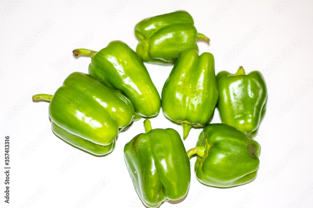 Fresh green capsicum or bell pepper isolated on a white background
Fresh green capsicum or bell pepper isolated on a white background