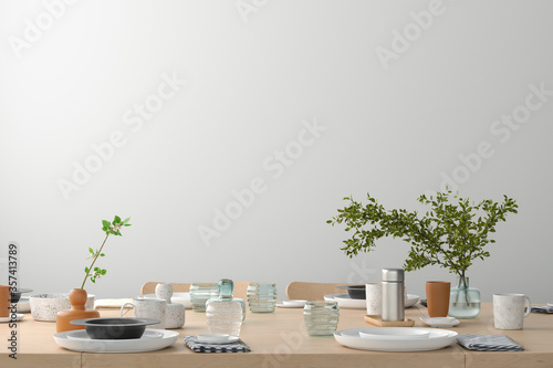 Blank white wall mock up in the dinning room with served table. 3d render photo