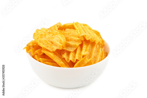 Potato chips on bowl isolated on white background
