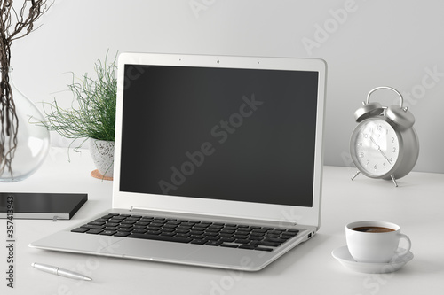Workspace with laptop mock up. White desk and white wall. Side view. Clipping path around laptop screen. 3d illustration