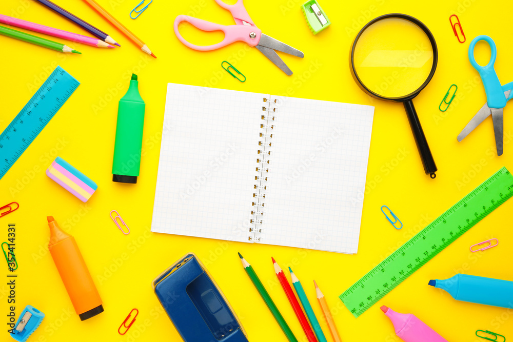 Back to school concept on yellow background. Top view Back to school concept on yellow background. Top view