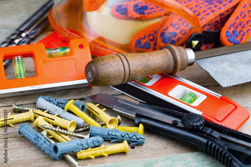 Different tools on the old background. Different tools on the old background.