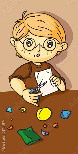 Cute boy cut paper craft at art masterclass