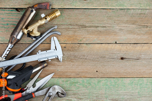 Different tools on the old background. 