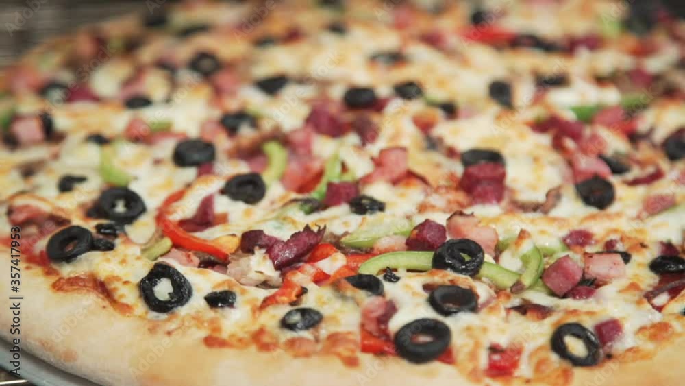 Meat pizza. Pizza in the oven. The process of making Italian pizza. Pizza is preparing in the kitchen of the restaurant. Meat pizza. Pizza in the oven. The process of making Italian pizza. Pizza is preparing in the kitchen of the restaurant.