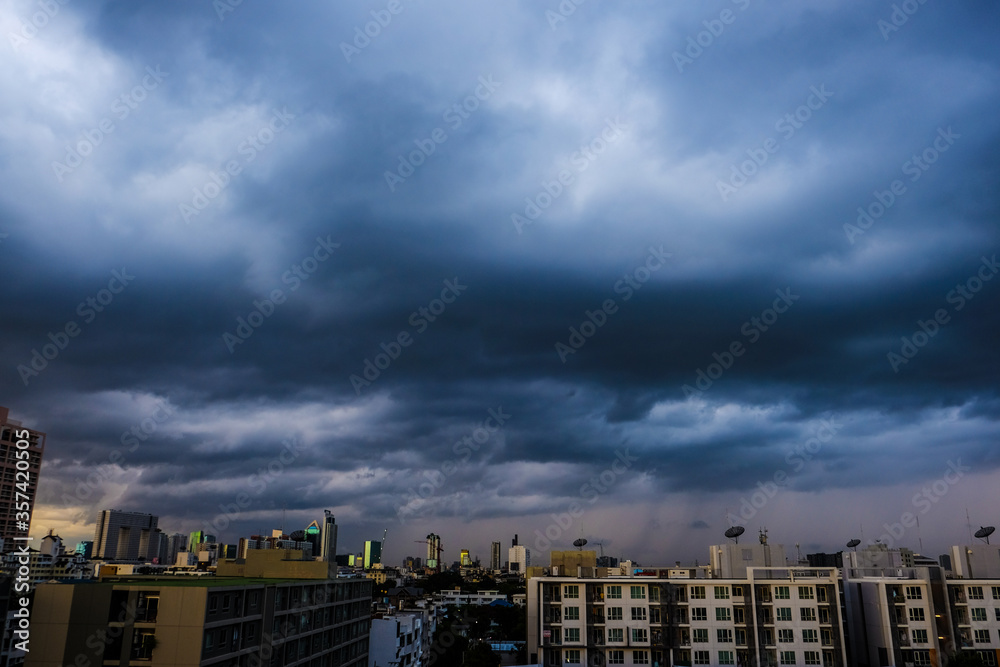 Before big rainy cloud sunset sky with city building Before big rainy cloud sunset sky with city building