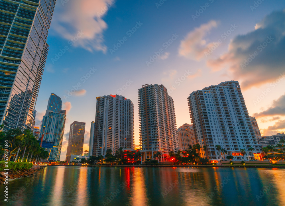 Fototapeta premium Miami florida Brickell key skyline at sunrise buildings architecture vacation 