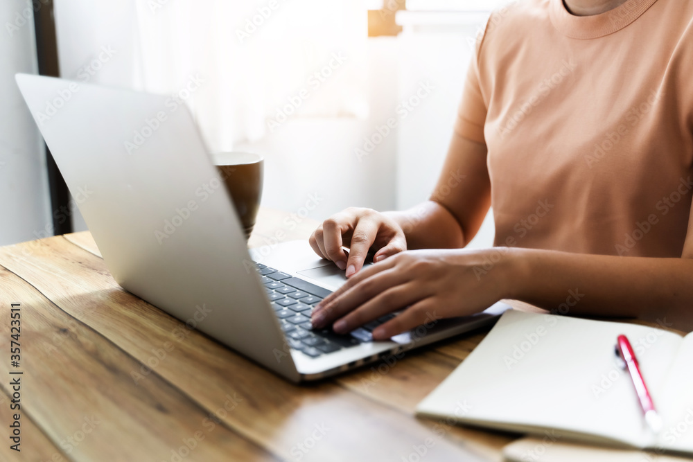 Naklejka premium close up woman studying online with laptop, Working from home.