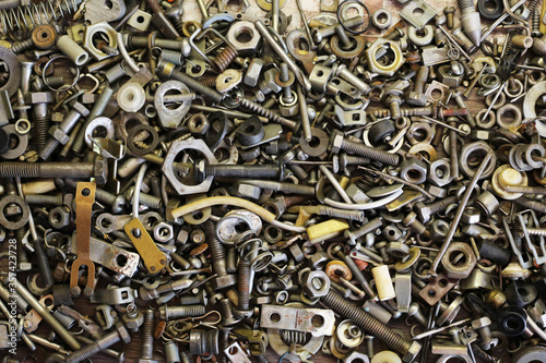 assortment of bolts and screws for background, top view