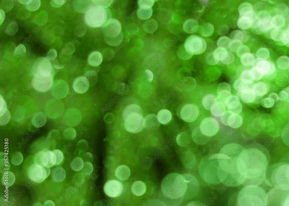 Fototapeta premium Golden and green blur bokeh background.