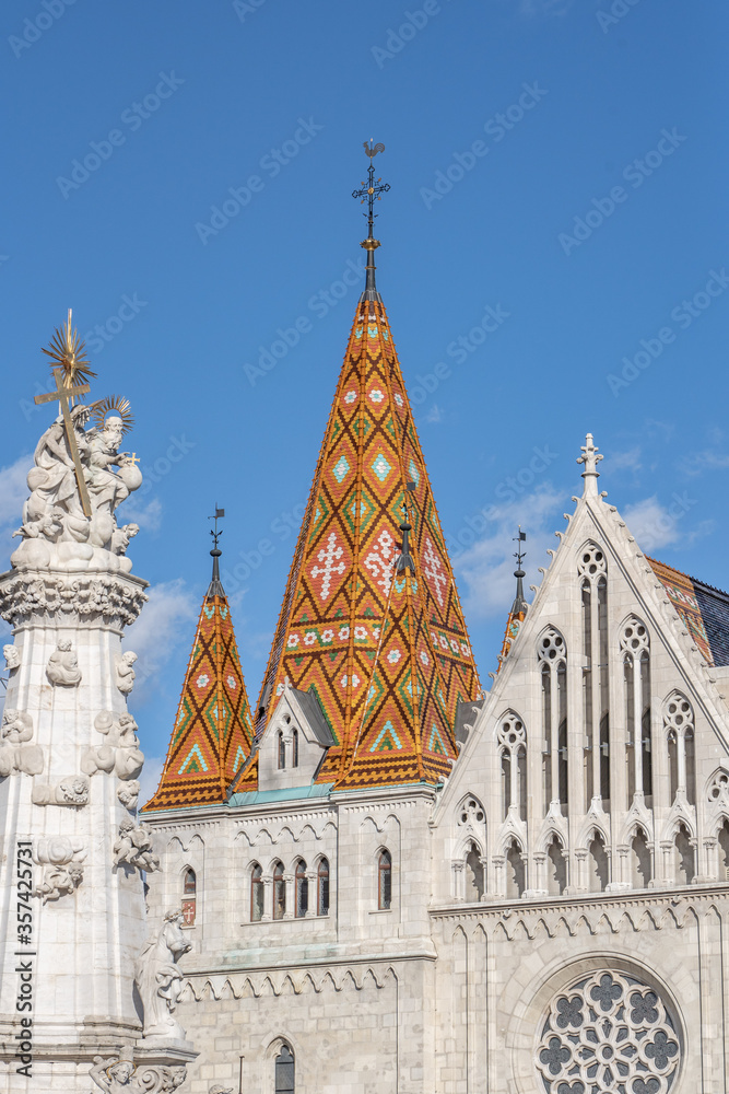 Facade view of Matthias Church on fisherman's Bastion on buda hill in Budapest winter morning