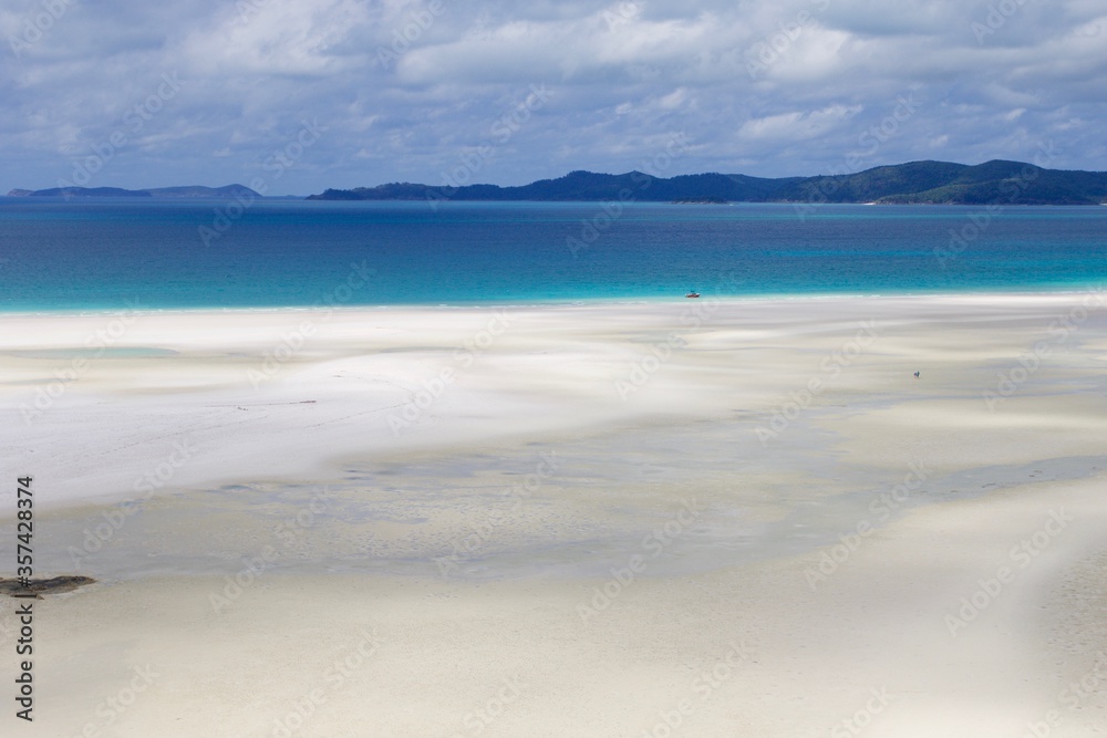 White sand beach and turquoise sea water, Whitsunday island, Australia White sand beach and turquoise sea water, Whitsunday island, Australia