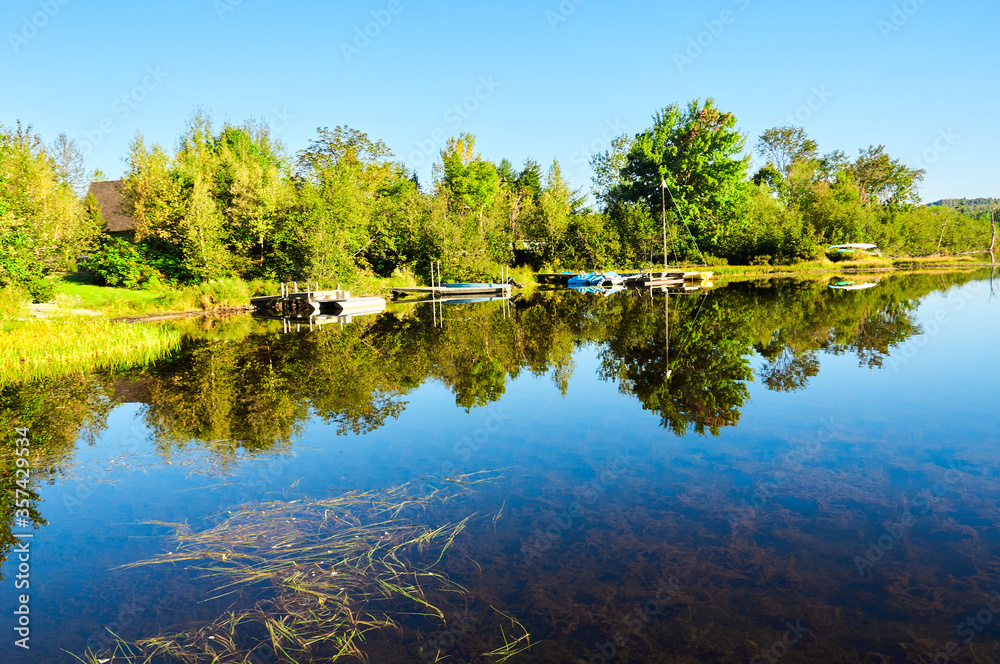 A great vacation day on the edge of a lake.