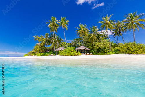 Amazing summer beach landscape. Exotic island coastline with palm trees and white sand close to amazing blue sea and lagoon. Tropical nature paradise beach scenery, fantastic vacation or holiday view