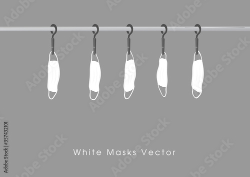 A white masks vector hung on a clothesline