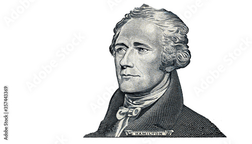 Alexander Hamilton cut on 10 dollar banknote isolated on white background photo